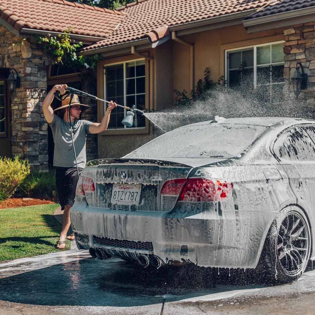 Exterior auto detailing showing polished car paint and clean wheels