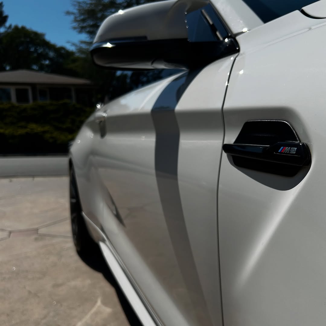 Wheel and tire detailing showing glossy finish